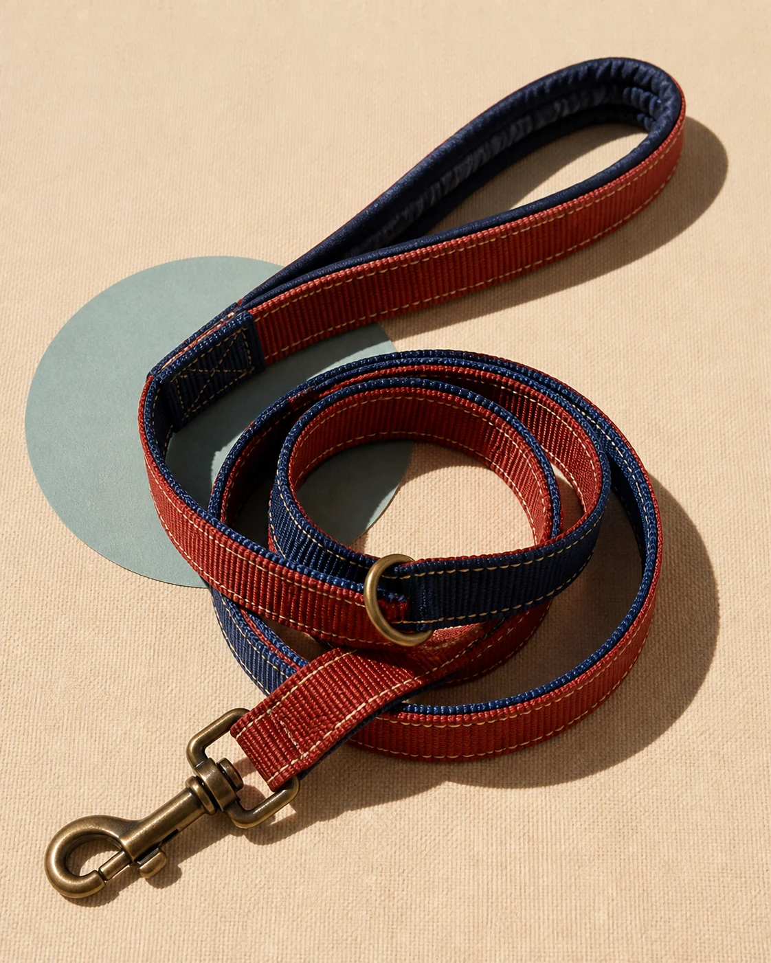 Coiled clay and navy Trail Lead with bronze hardware